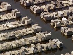 Sept. 11, 2005 aerial flooded cemetery in aftermath of Hurricane Katrina / New Orleans Stock Footage