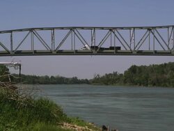 Panning view of bridge over the Missouri River. Stock Footage