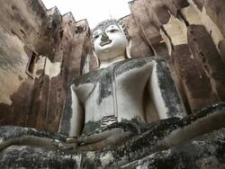 Dolly shot: Big buddha in Sukhothai historical park Thailand Stock Footage