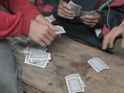 MS group of men playing cards and gambling / Xam Neua, Laos Stock Footage