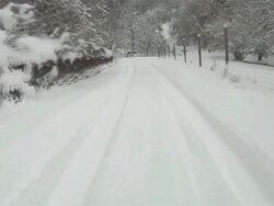 MS POV Car being driven through winter landscape / Saarburg, Rhineland-Palatinate, Germany Stock Footage