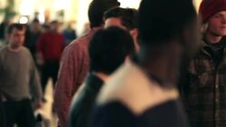 Friends walk through crowded downtown Las Vegas Stock Footage