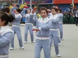 MS Kindergarten teacher dancing in traditional festive folk celebration or carnival during chinese spring festival  AUDIO  / xi'an, shaanxi, china Stock Footage