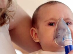 Baby Girl Inhaling Medicine Stock Footage