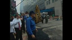 Giuliani touring Ground Zero with press News Clip