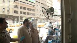 CLEAN: Streetside showers in boiling Baghdad summer News Clip