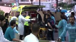 Injured arrive at hospital for treatment, other wounded survivors at scene News Clip