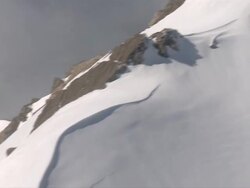 AERIAL WS POV View of grass field and snow mountain / Montana, United States Stock Footage