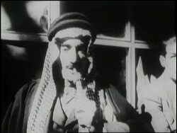 An Egyptian man smokes a hookah pipe. News Clip