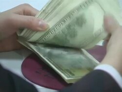 Yuan & US Dollars Counted at CITIC Bank Branch News Clip