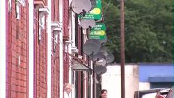 Terraced houses and satellite dishes in Welsh village News Clip