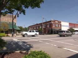 Vehicles Passing Through Intersection News Clip