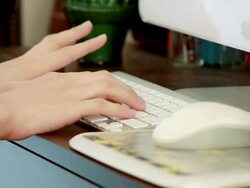 MS Shot of Young woman using keyboard in her room / Nakano, Tokyo, Japan Stock Footage
