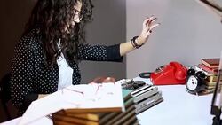 Geeky girl at the typing machine Stock Footage