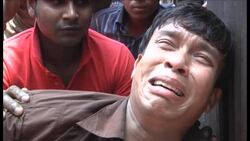 An eight-story building housing several garment factories collapsed near Bangladesh's capital on Wednesday, killing at least 87 people and trapping many more under a jumbled mess of concrete. News Clip