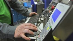 CU Engineer's Hands Programming A Machine Stock Footage
