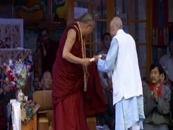 WS  Dalai Lama presenting  with  book at his 70th birthday AUDIO / Dharmasala, Himachal Pradesh, India Stock Footage
