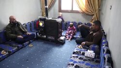 CLEAN : Winter hit Syrians turn to pistachio shells for heat News Clip