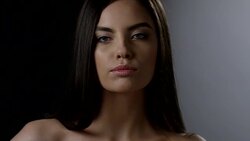 Close-up of a brunette fashion model`s face. Fashion video. Stock Footage