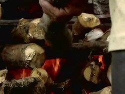 CU Man keeping the fire of the boilers of the sulfur mining / Ijen, Java, Indonesia Stock Footage