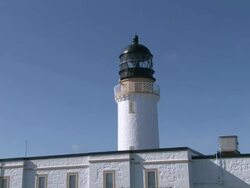 ZI Cape Wrath Lighthouse on a clear sunny day / Cape Wrath, Northern Highlands, Scotland Stock Footage
