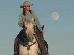 MS Women Riding Horses through Majestic Red Rock Mountains with full moon / Telluride, Colorado, United States  Stock Footage