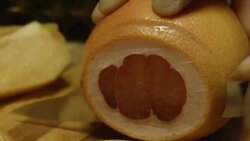 Slicing red Grapefruit Stock Footage