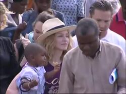 Pop star visits new day care centre she is funding News Clip