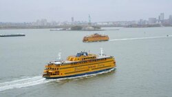 'WS TU AERIAL Shot of Staten island ferry with Statue of liberty / New York City, United States' Stock Footage