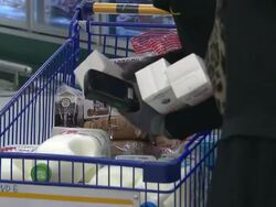 Shot of People fill the shopping cart. Stock Footage