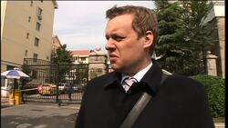 Phone i/v with wife of Chinese dissident who won Nobel prize, exteriors of home Instructional Video