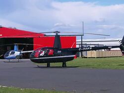 Stationary helicopter in airfield, Northern Ireland Stock Footage