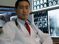 CU PAN Doctor looking at x-rays / Albany, New York, United States Stock Footage