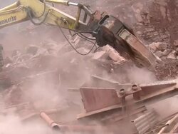 MS Demolition of crushing machine at quarry by bulldozer / Taben-Rodt, Rhineland-Palatinate, Germany Stock Footage