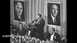 Jack Warner takes the podium at the Motion Picture Pioneers dinner in 1951 News Clip