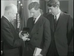 U.S. President Dwight D. Eisenhower presents explorers John Hunt and Edmund Hillary with Hubbard Medals. News Clip