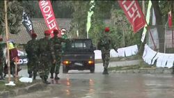 Volcano spews searing ash after lull, displaced people News Clip