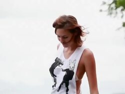 MS TS TD Female modelling around perimeter of pool with tropical hills and coastline / Montezuma, Punteranes, Costa Rica Stock Footage