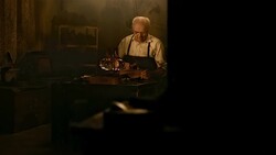 HD DOLLY: Vintage Shoemaker Stock Footage