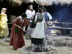 MS Shot of Cooking in Camp life at Medieval party showing marriage of 1475 with medieval clothing/ Landshut, Bavaria, Germany Stock Footage