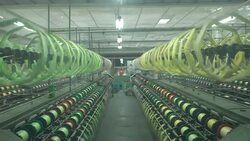 Chinese textile factory interior and machines working scene Stock Footage
