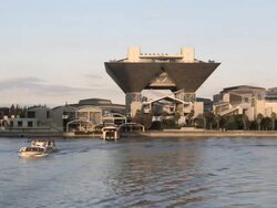 Big Sight Exhibition Centre with Sightseeing Boats, Tokyo, Japan Stock Footage