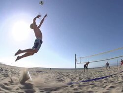 Men playing beach volleyball. Stock Footage