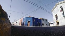 Young adult male rollerblade in urban street Stock Footage