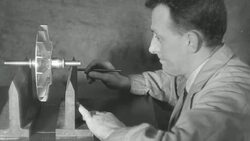 MONTAGE Steel worker testing steel engine rotor for an airplane / United Kingdom Stock Footage
