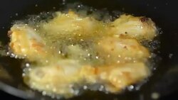 six Fried Chickens are cooked Stock Footage