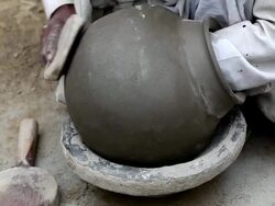 Potter Shaping a Pot at his Home Stock Footage