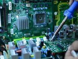 Engineer soldering circuit board computer. Stock Footage