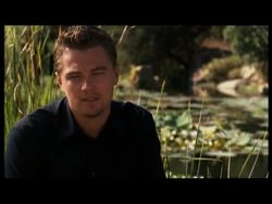 NEW Leonardo DiCaprio questioned about travel to Cannes at press conference News Clip