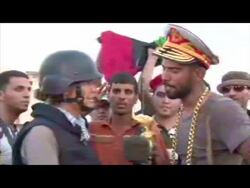 Interview with Rebel in the Gaddafi Compound News Clip